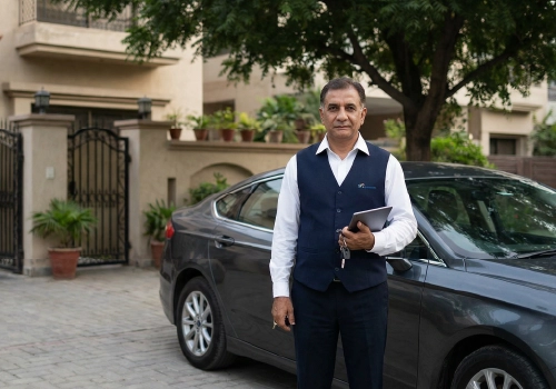 Professional driver performing daily duties and providing reliable transportation services in Karachi.